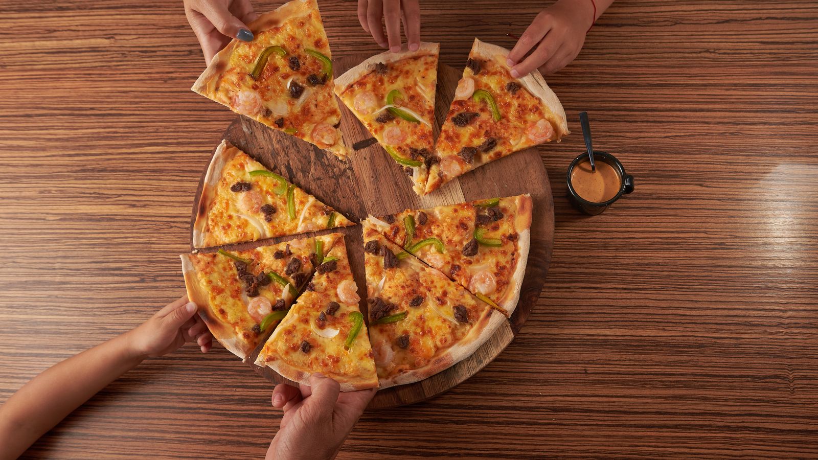 Pizza shared at a table